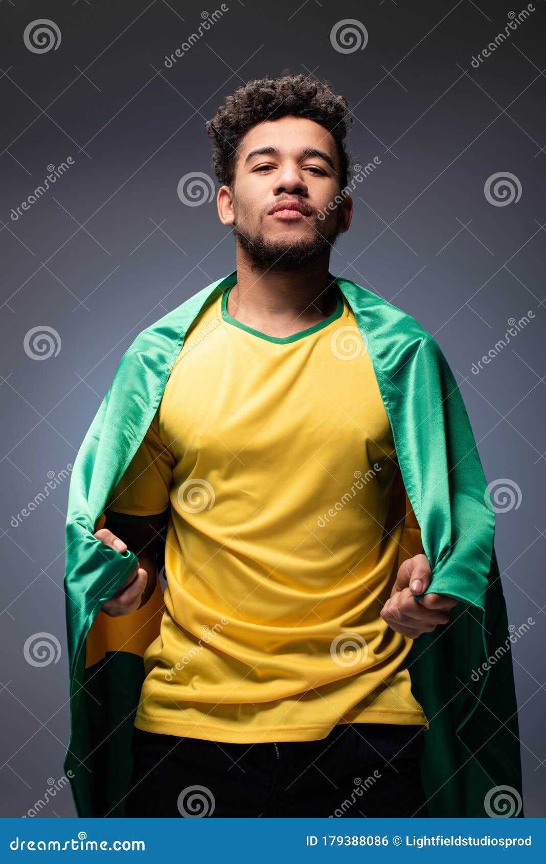 African American Football Fan Wrapped in Stock Photo - Image of ...