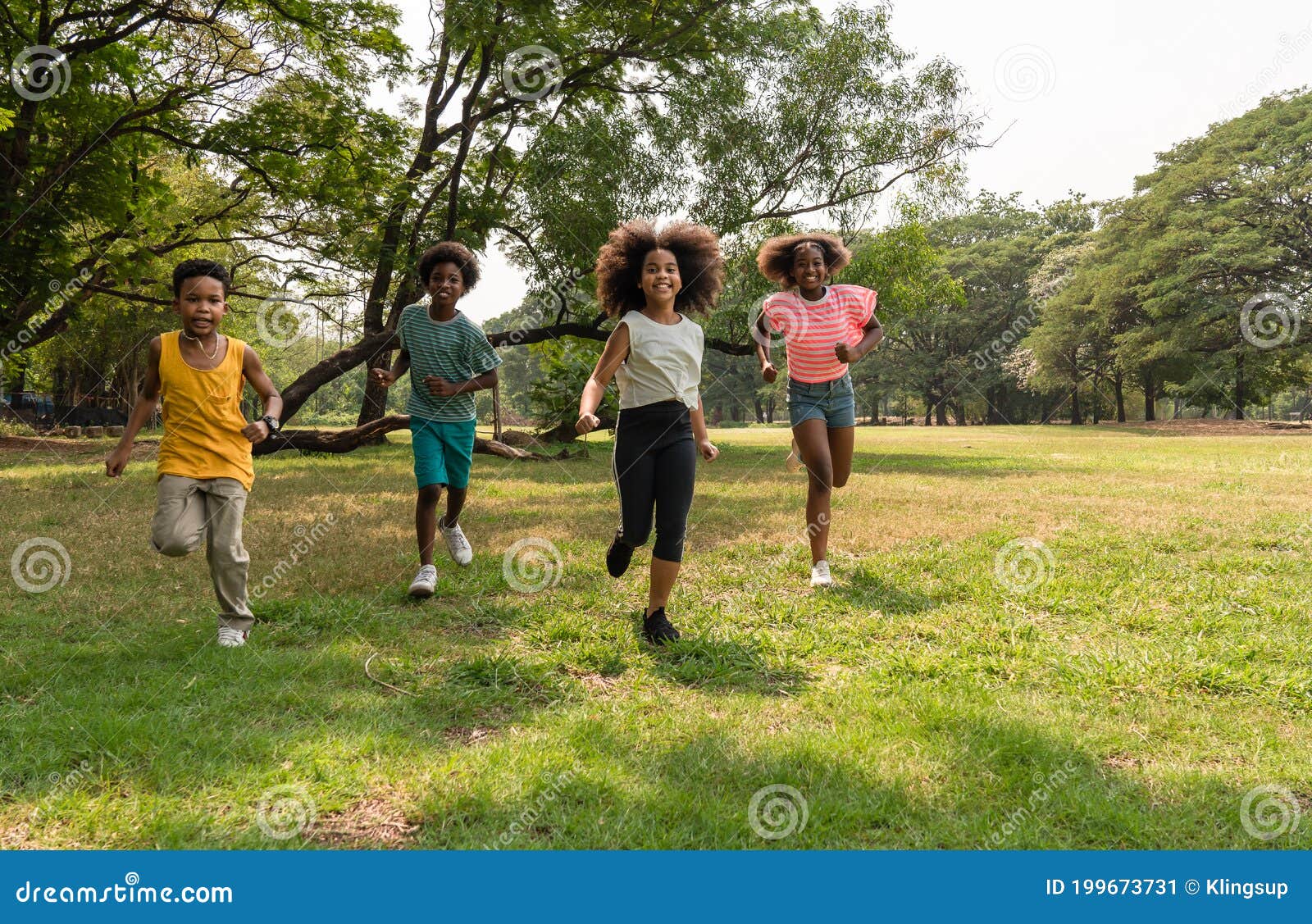 A group of african children playing in a park