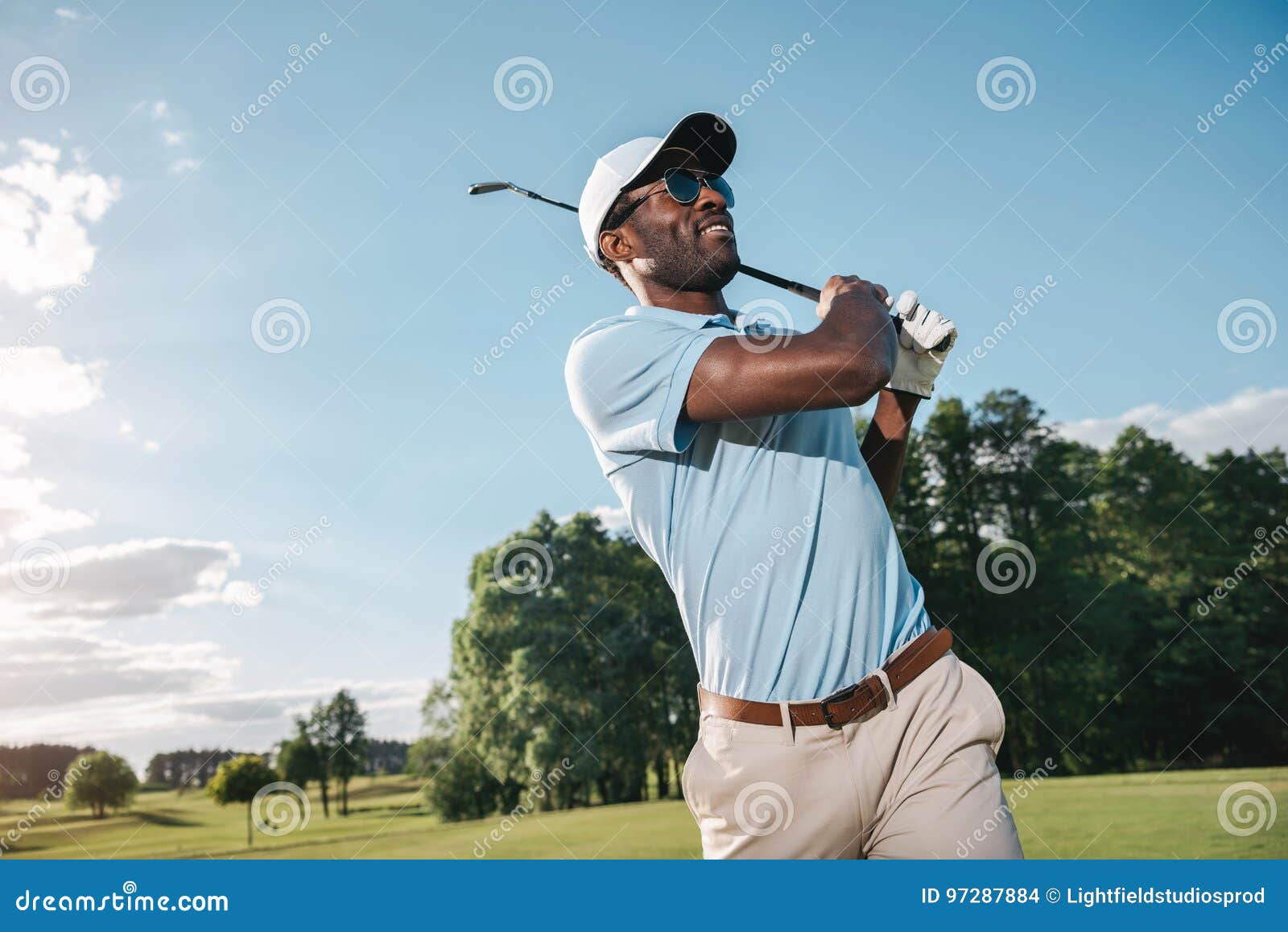 African American Man in Cap and Sunglasses Playing Golf Stock Photo Image of wood, person