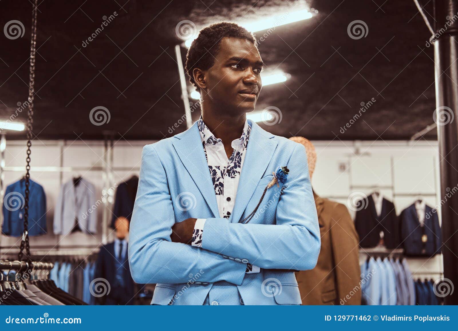 African-American Man Dressed in Blue Elegant Suit Posing with Crossed ...