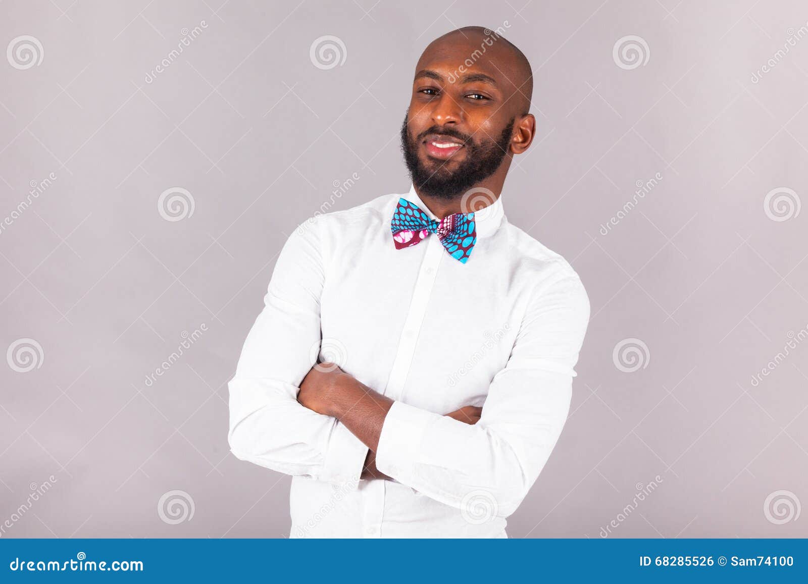 African American Man with Folded Arms Wearing a Bow Tie Stock Photo ...