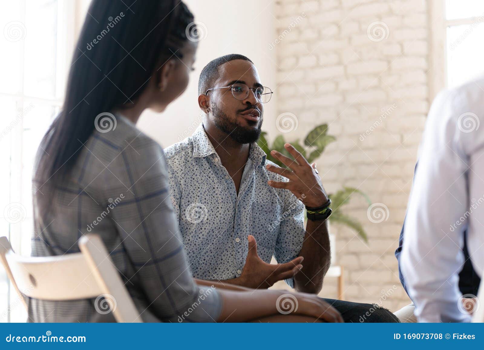 african american man speak at group therapy session