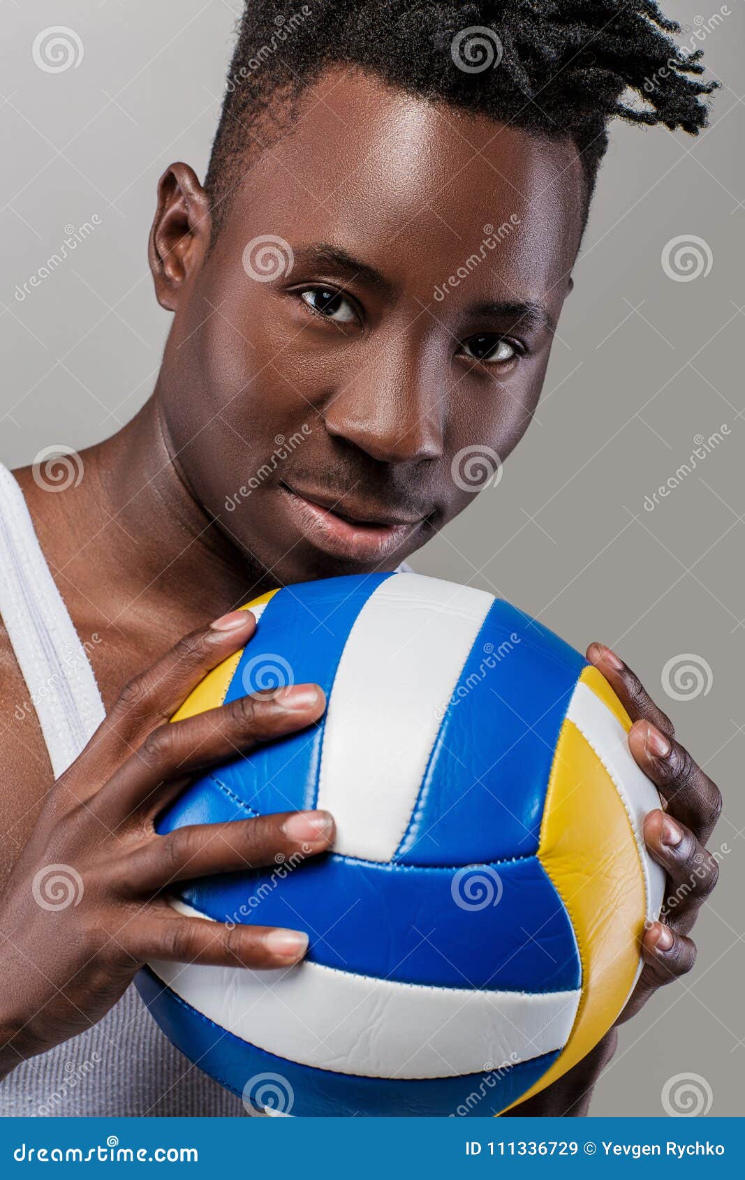 Athletic African-American Man With Volleyball Stock Photo 