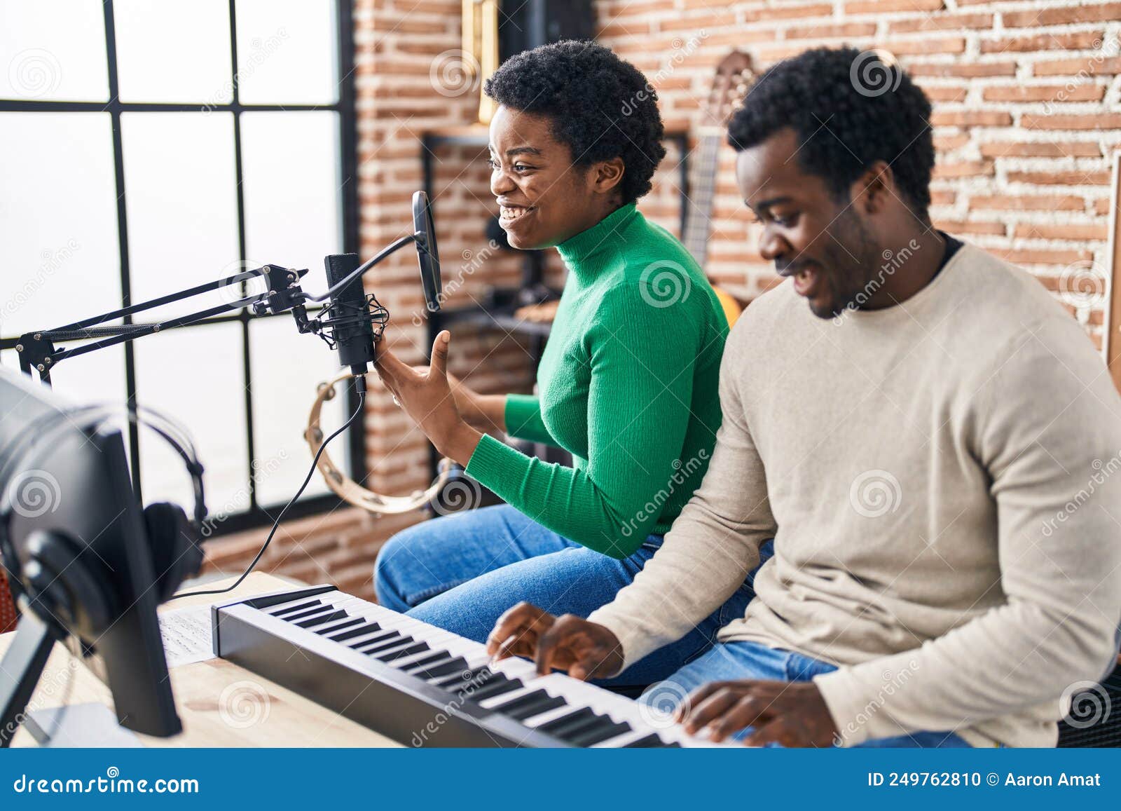 African American Man And Woman Music Group Singing Song Playing african-american-man-and-woman-music-group-singing-song-playing