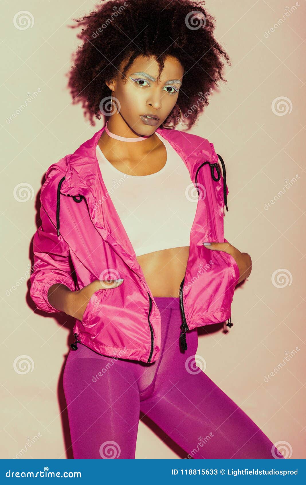 African American 80s Girl In Pink Clothes Posing Stock Image