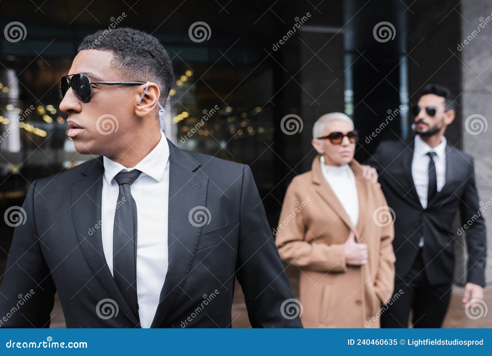 african american security man in sunglasses