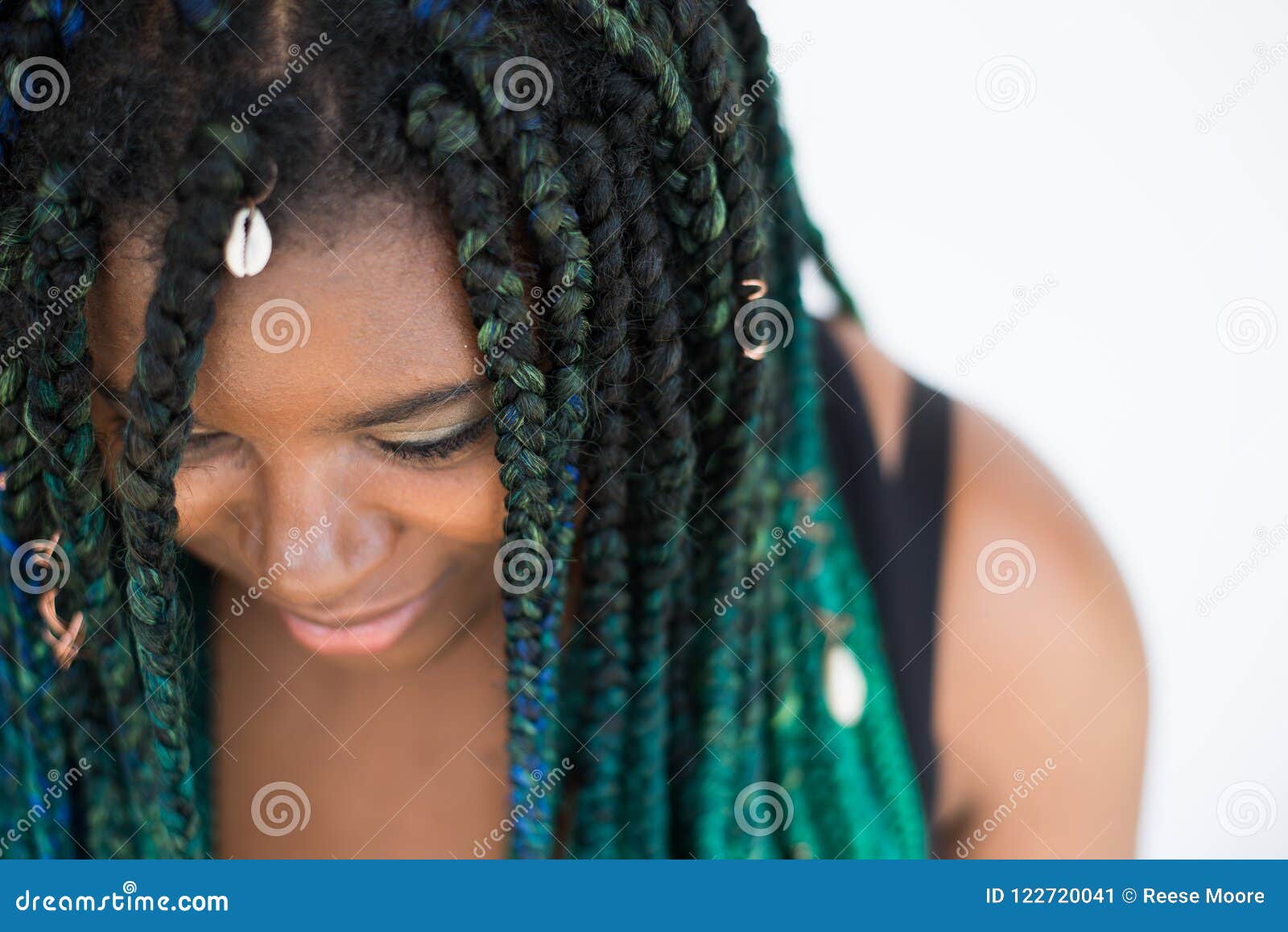 African American Woman With Beautiful Teal Green Blue Braids