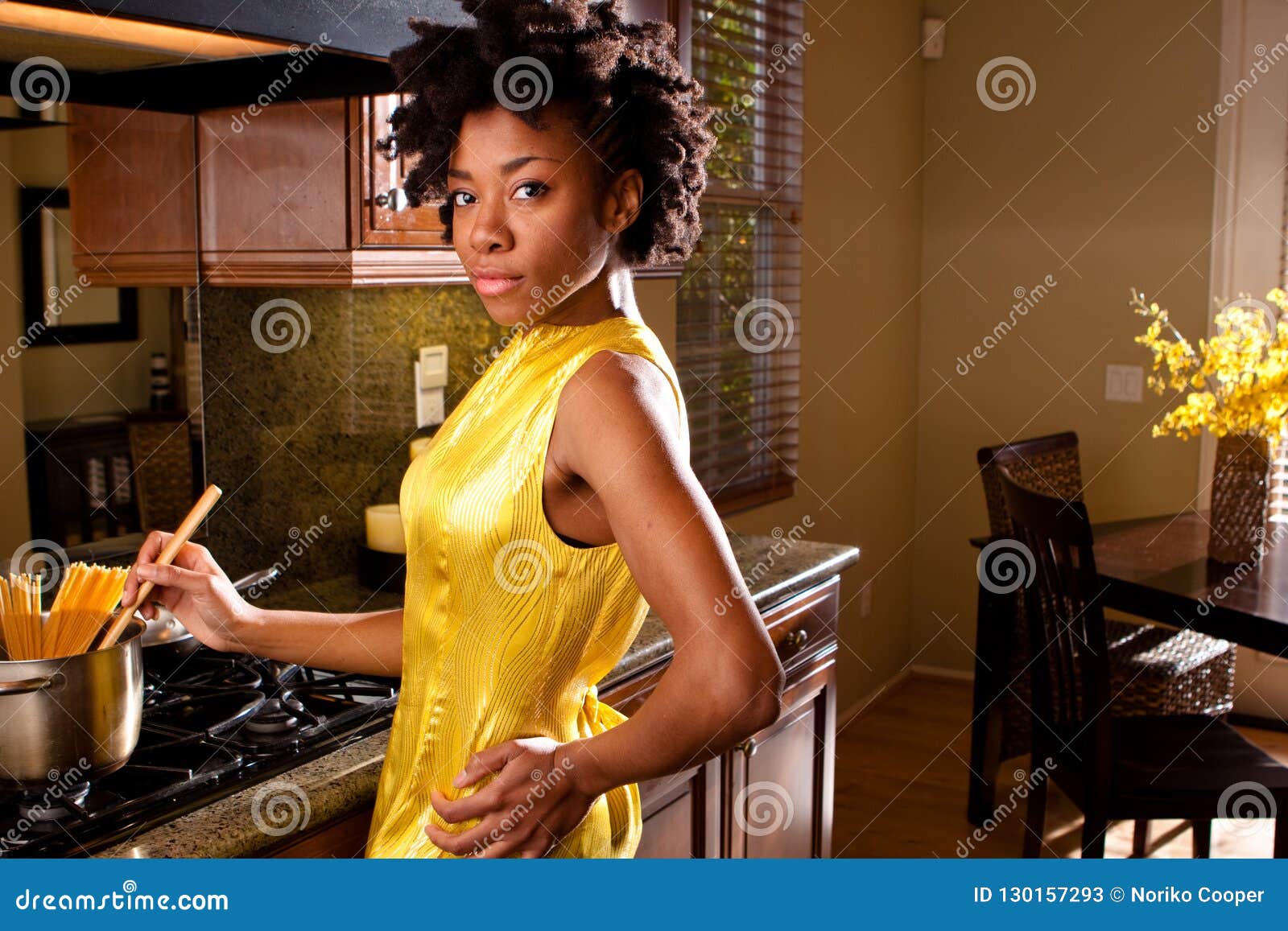 https://thumbs.dreamstime.com/z/african-american-woman-cooking-kitchen-happy-130157293.jpg