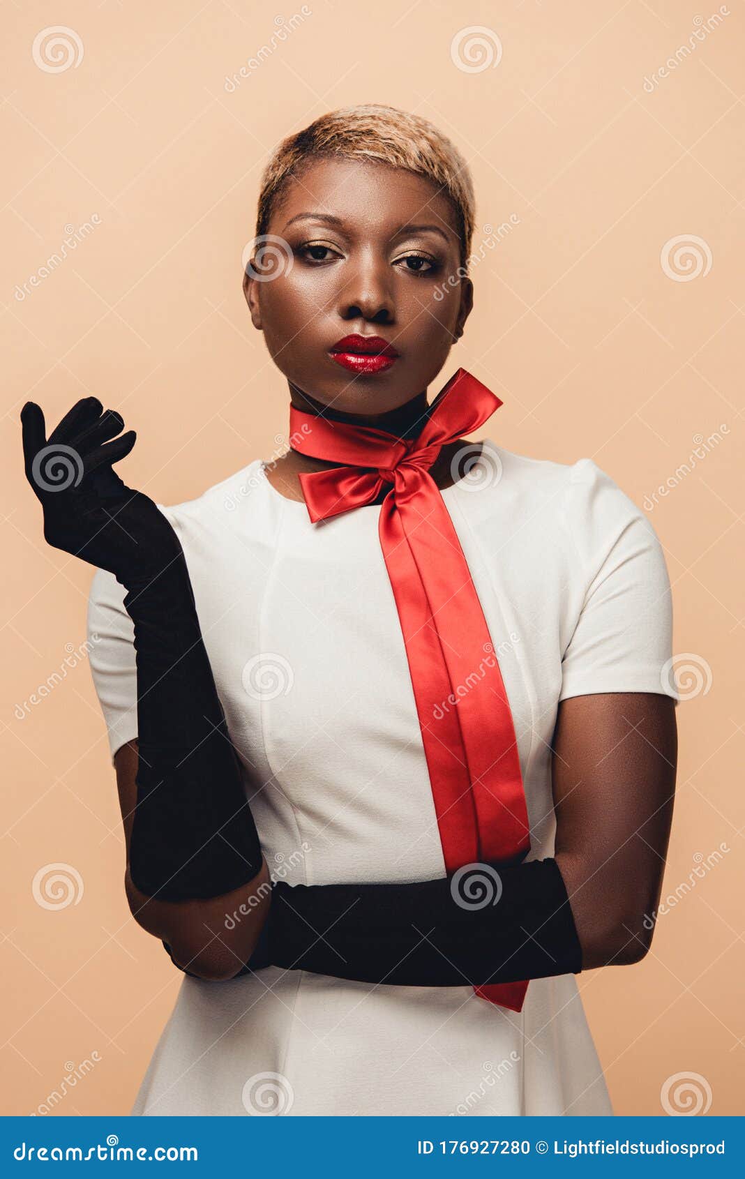 African American Woman Posing in White Dress, Red Scarf and Black ...