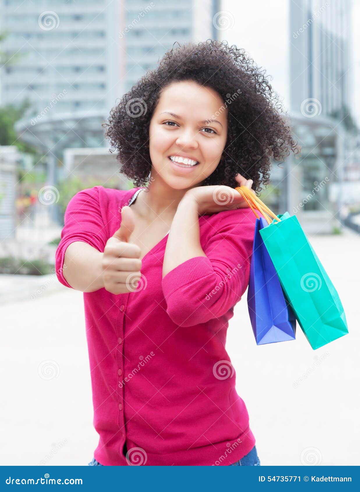 African American Woman with Shopping Bags Showing Thumb Stock Image ...