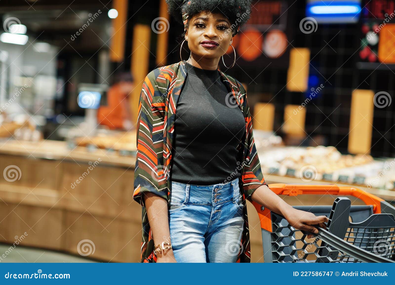 African American Woman with Shopping Cart Trolley in the Supermarket ...