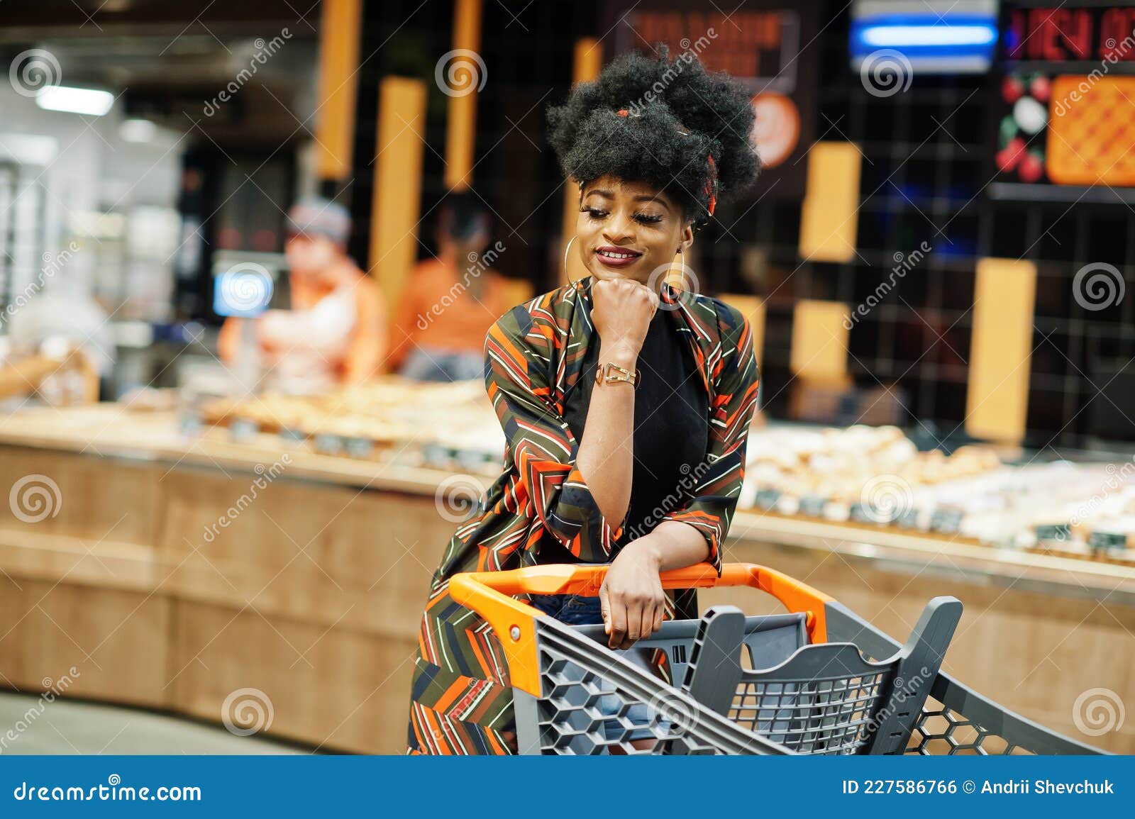 African American Woman with Shopping Cart Trolley in the Supermarket ...