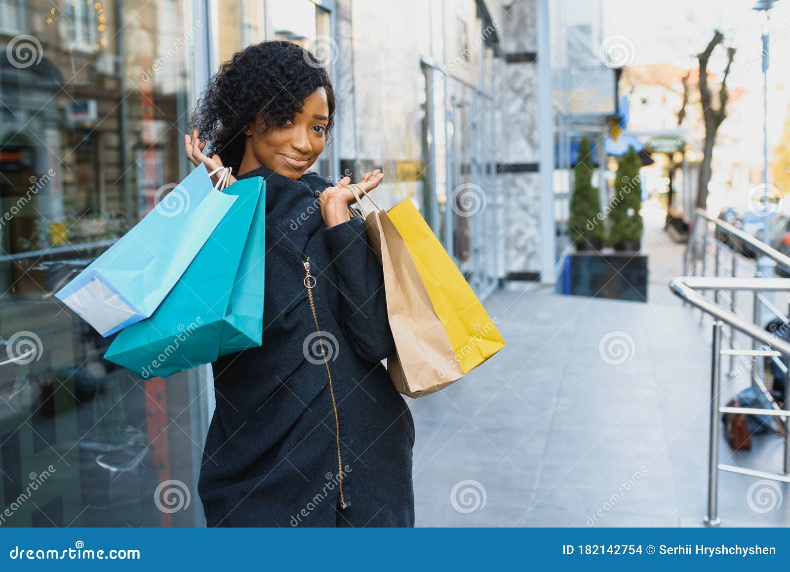 African American Woman Shopping. Seasonal Discounts Stock Photo - Image ...