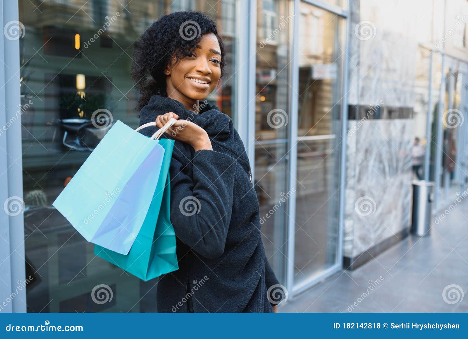 African American Woman Shopping. Seasonal Discounts Stock Photo - Image ...