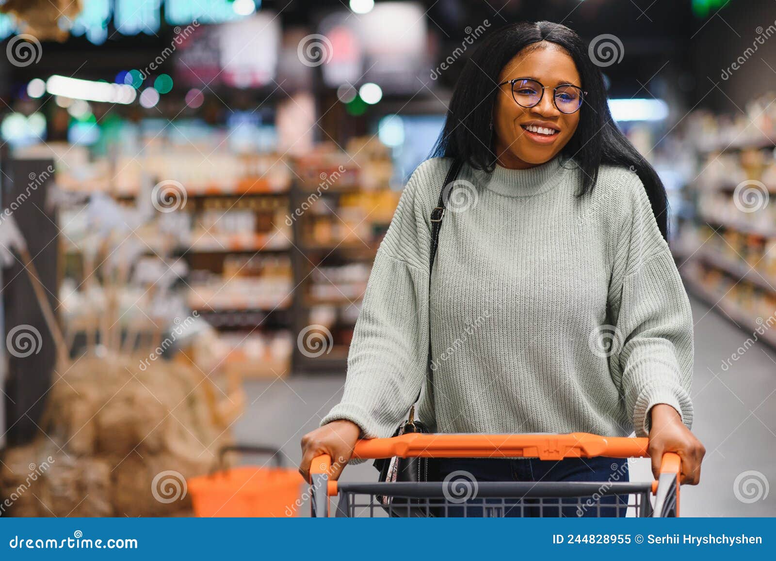 African American Woman at Supermarket with Shopping Cart Stock Image ...