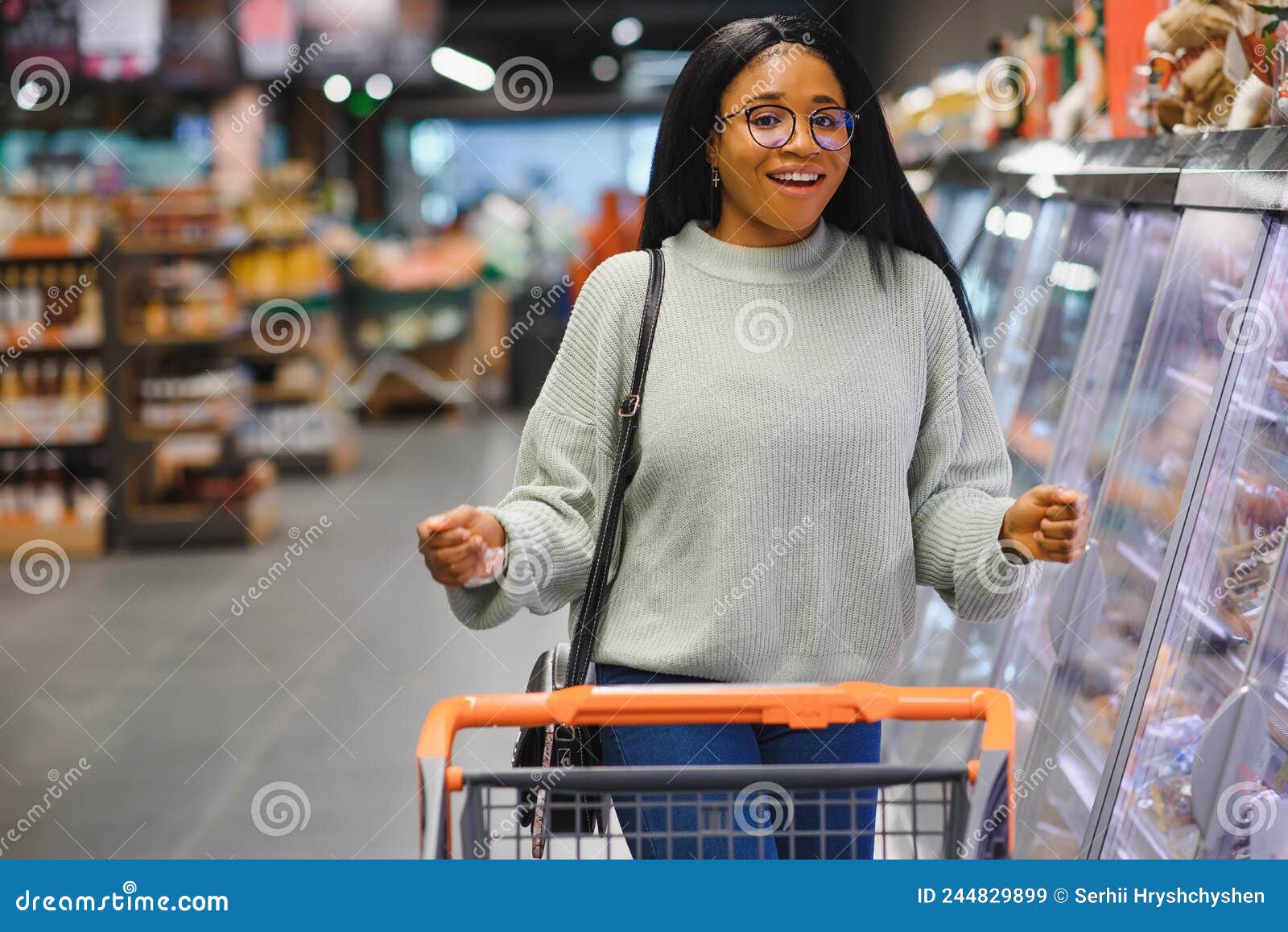 African American Woman at Supermarket with Shopping Cart Stock Image ...