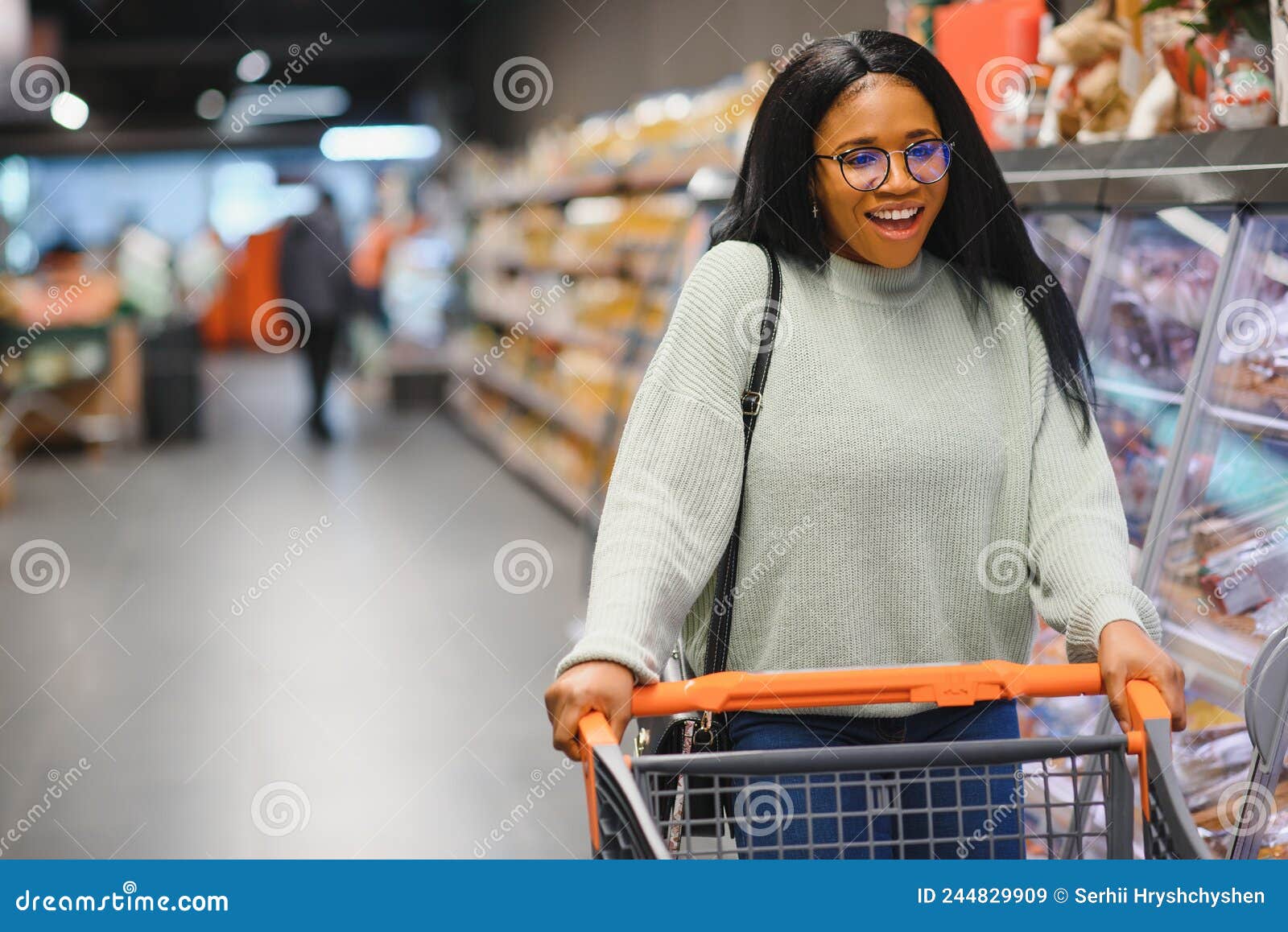 African American Woman at Supermarket with Shopping Cart Stock Image ...