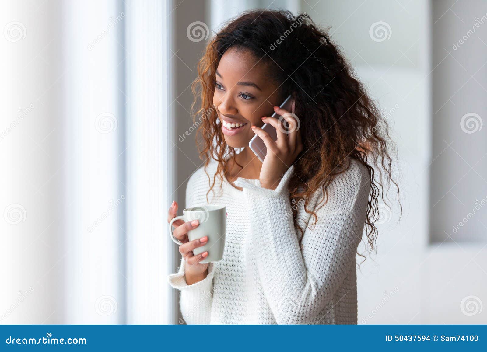 African American Woman Talking On A Mobile Phone - Black ...