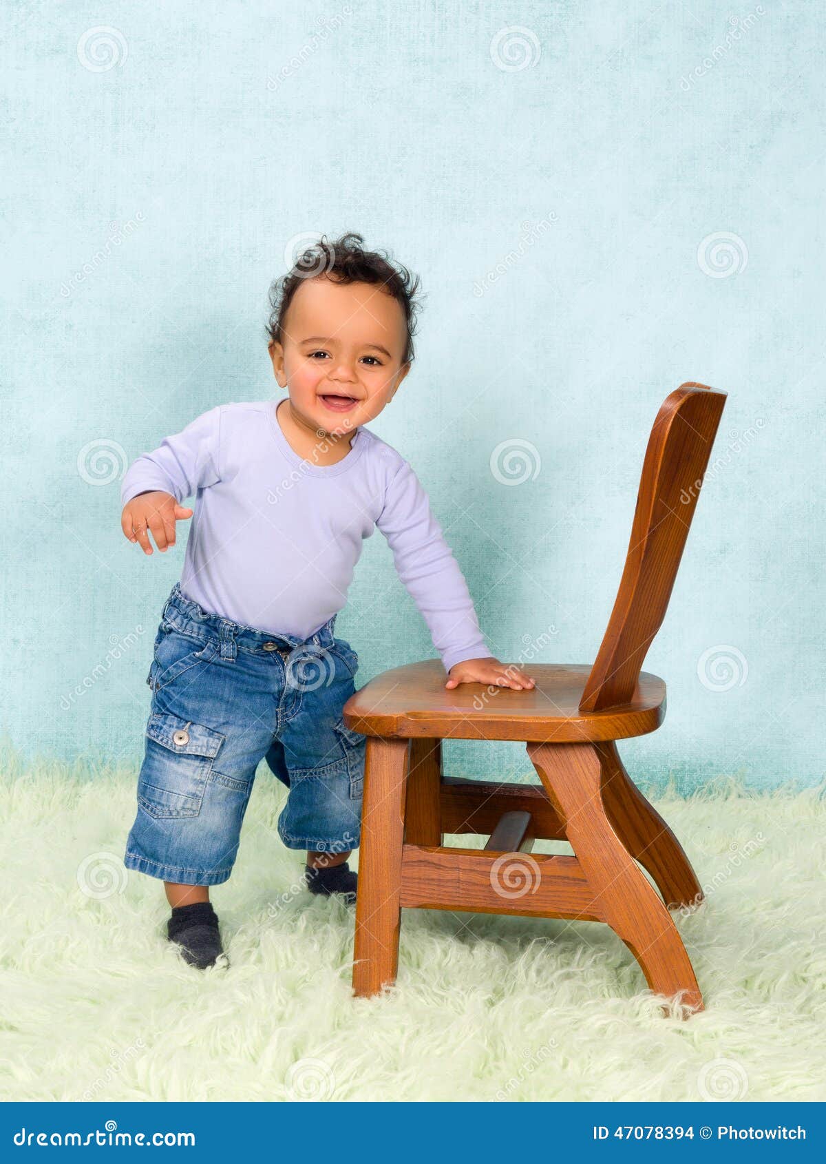 African Baby Boy Trying To Stand Stock Photo - Image: 47078394