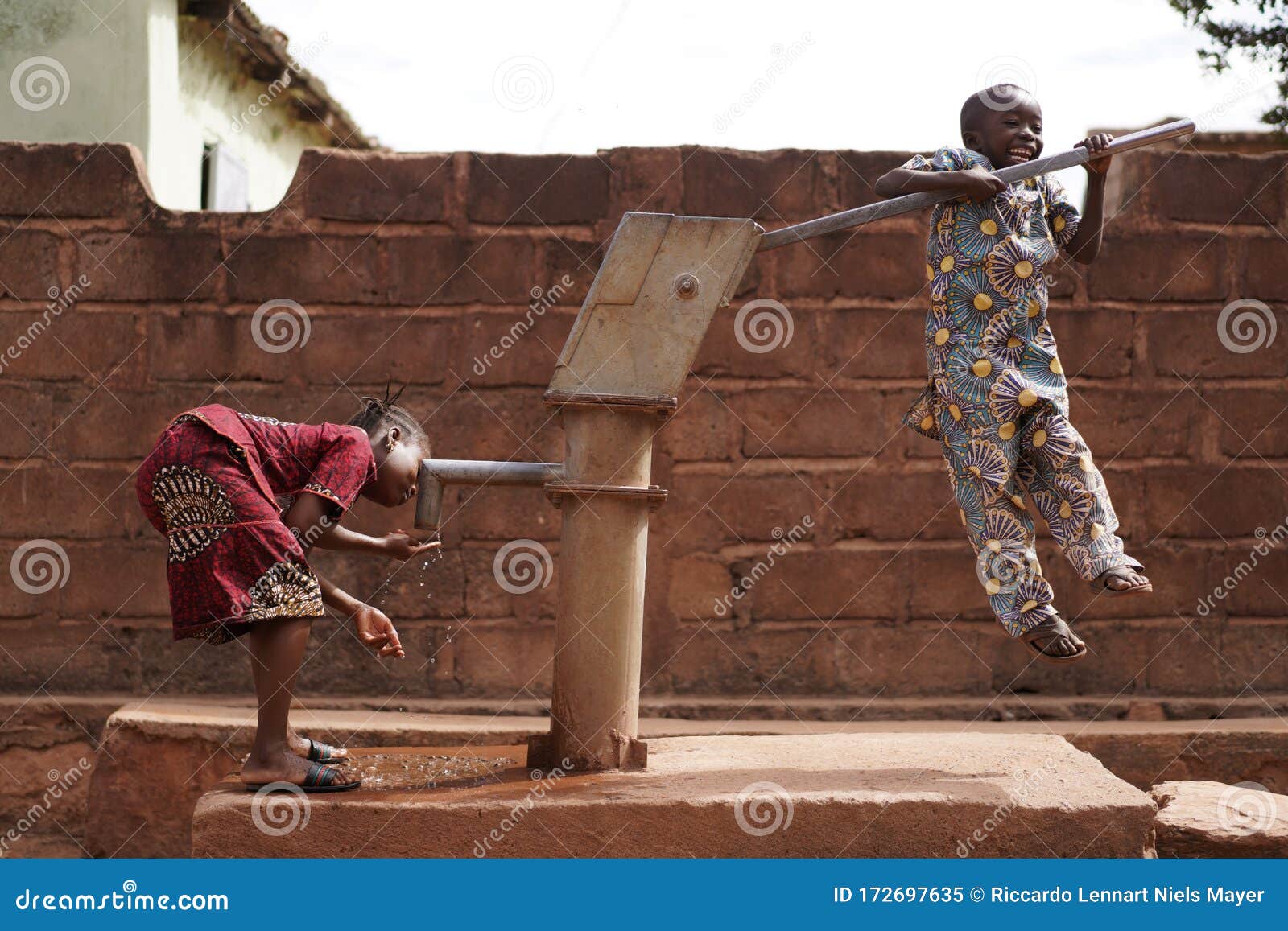 African Children Playing at the Village Water Pump Stock Image Image