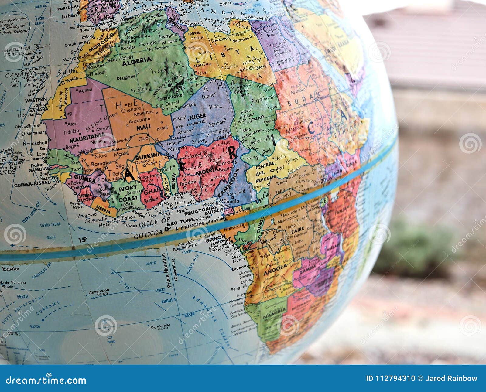 african continent focus macro shot on globe map for travel blogs, social media, website banners and backgrounds.