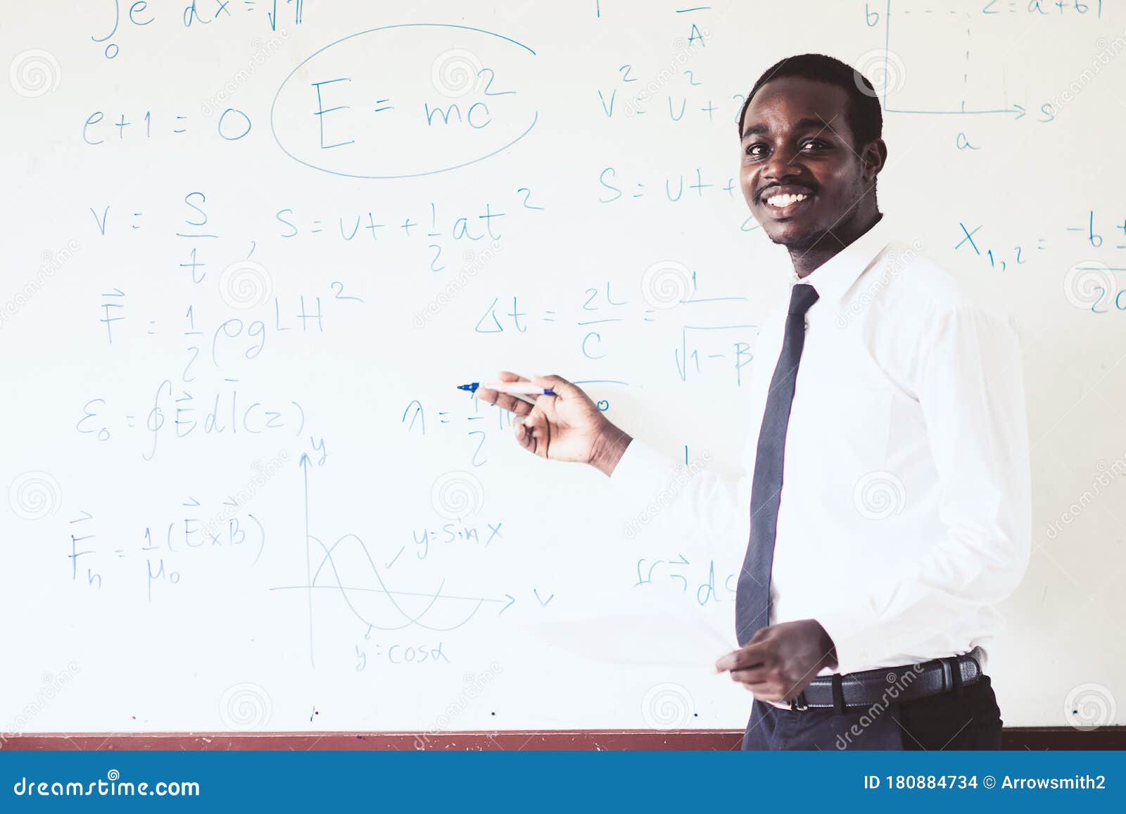 African Foreign Teacher Teaching Science in the Classroom Stock Photo