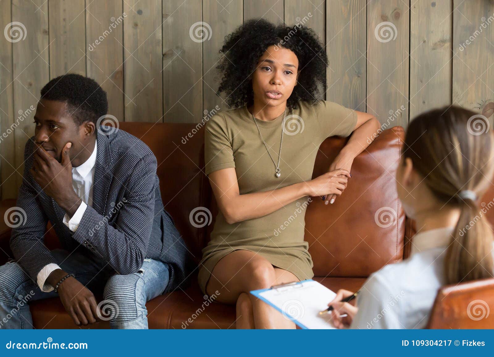 african frustrated wife talking to psychologist, family marriage