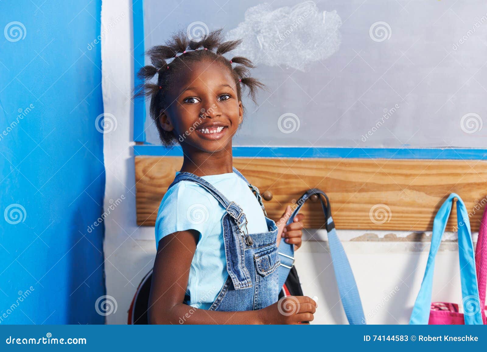 African Girl at Wardrobe of Kindergarten Stock Image - Image of braids ...