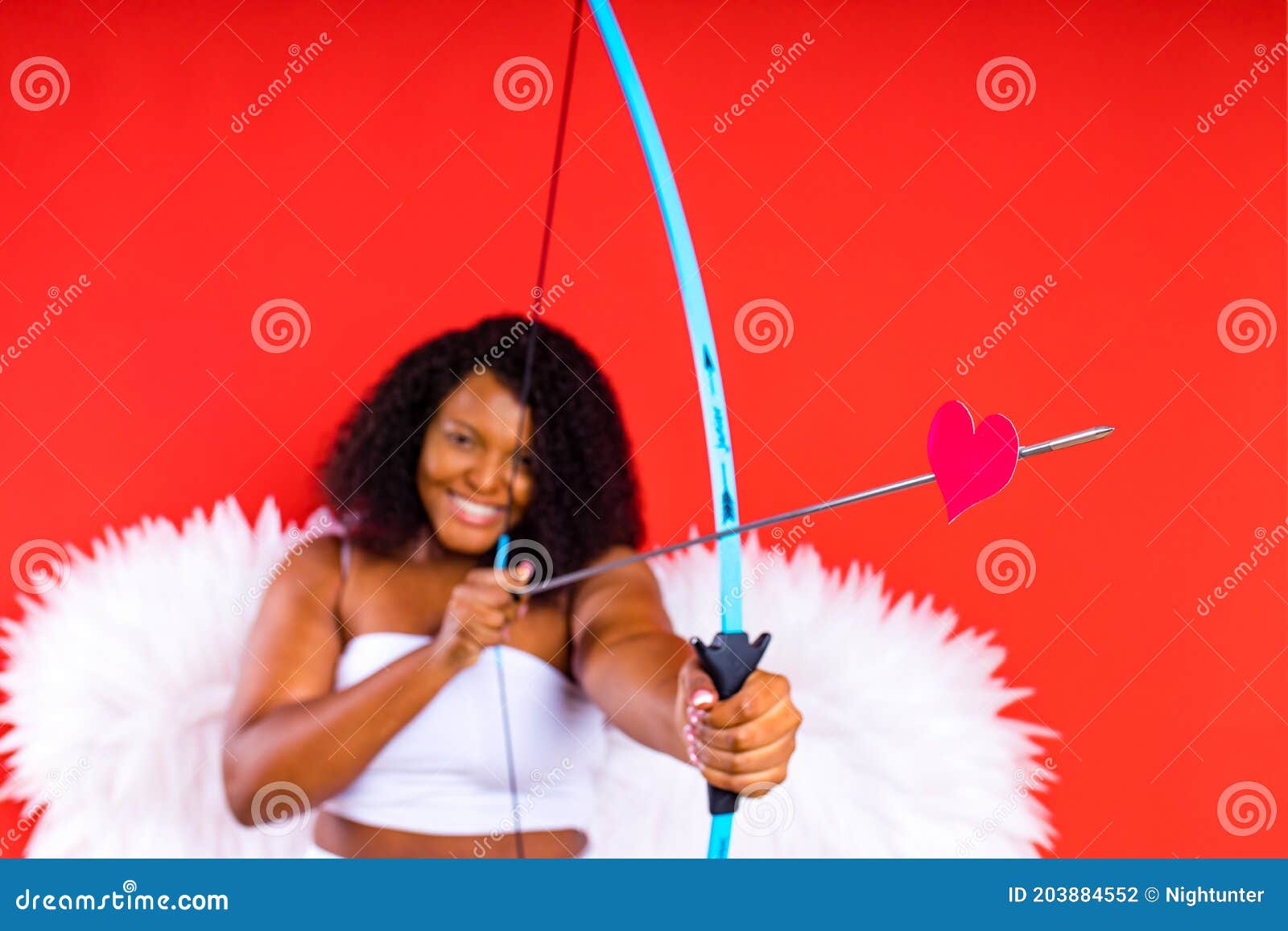 https://thumbs.dreamstime.com/z/african-latin-cupid-woman-wtite-top-bra-holding-bow-arrow-red-studio-th-february-valentine-s-day-203884552.jpg