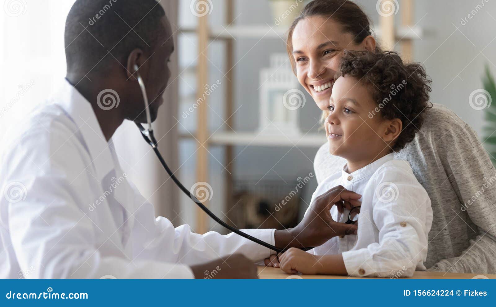 african male pediatrician hold stethoscope exam child boy patient