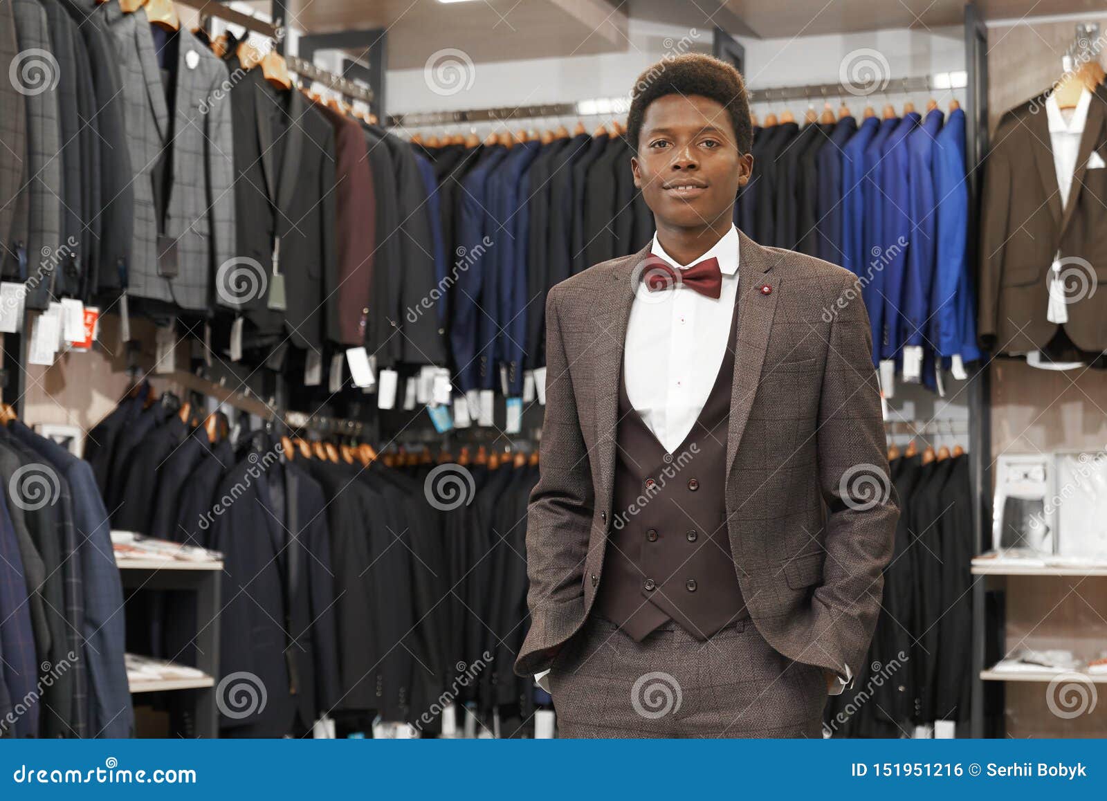 African Man in Boutique Wearing in Elegant Suit. Stock Photo - Image of ...