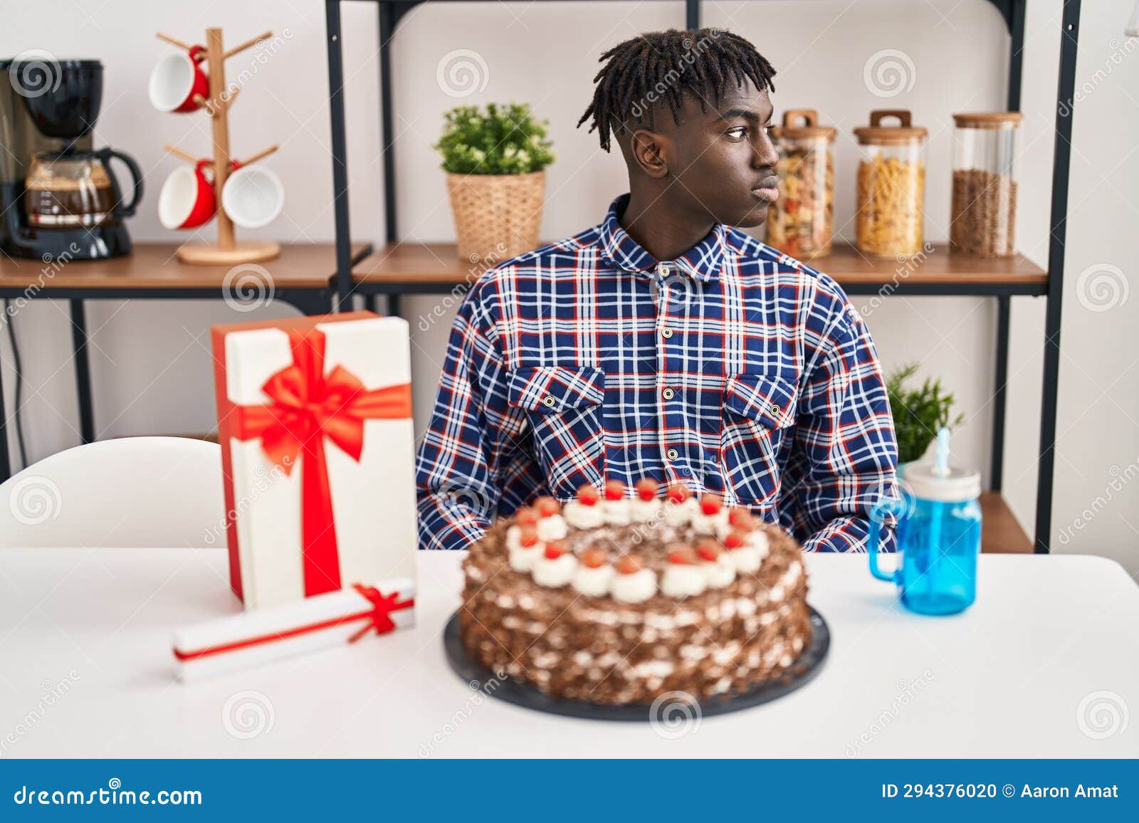 African Man with Dreadlocks Celebrating Birthday Holding Big Chocolate Cake  Looking To Side, Relax Profile Pose with Natural Face Stock Photo - Image  of celebration, funny: 294376020