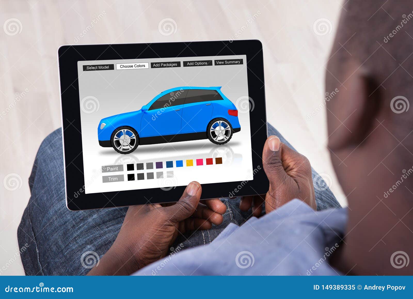 Man Choosing Car S Color On Digital Tablet Stock Image