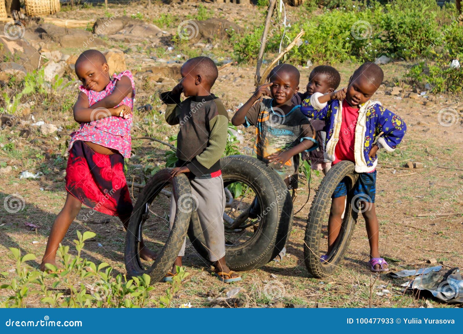 African Poor Boys Play with Wheels Editorial Stock Image - Image
