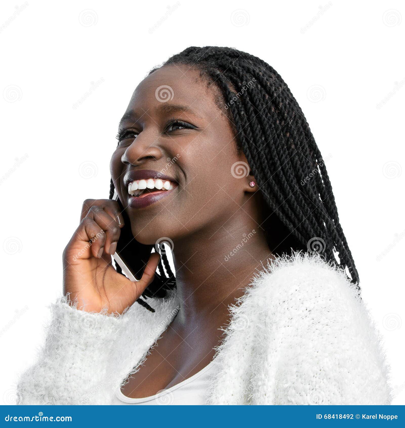 African Teen Girl With Braids Talking On Phone Stock Photo