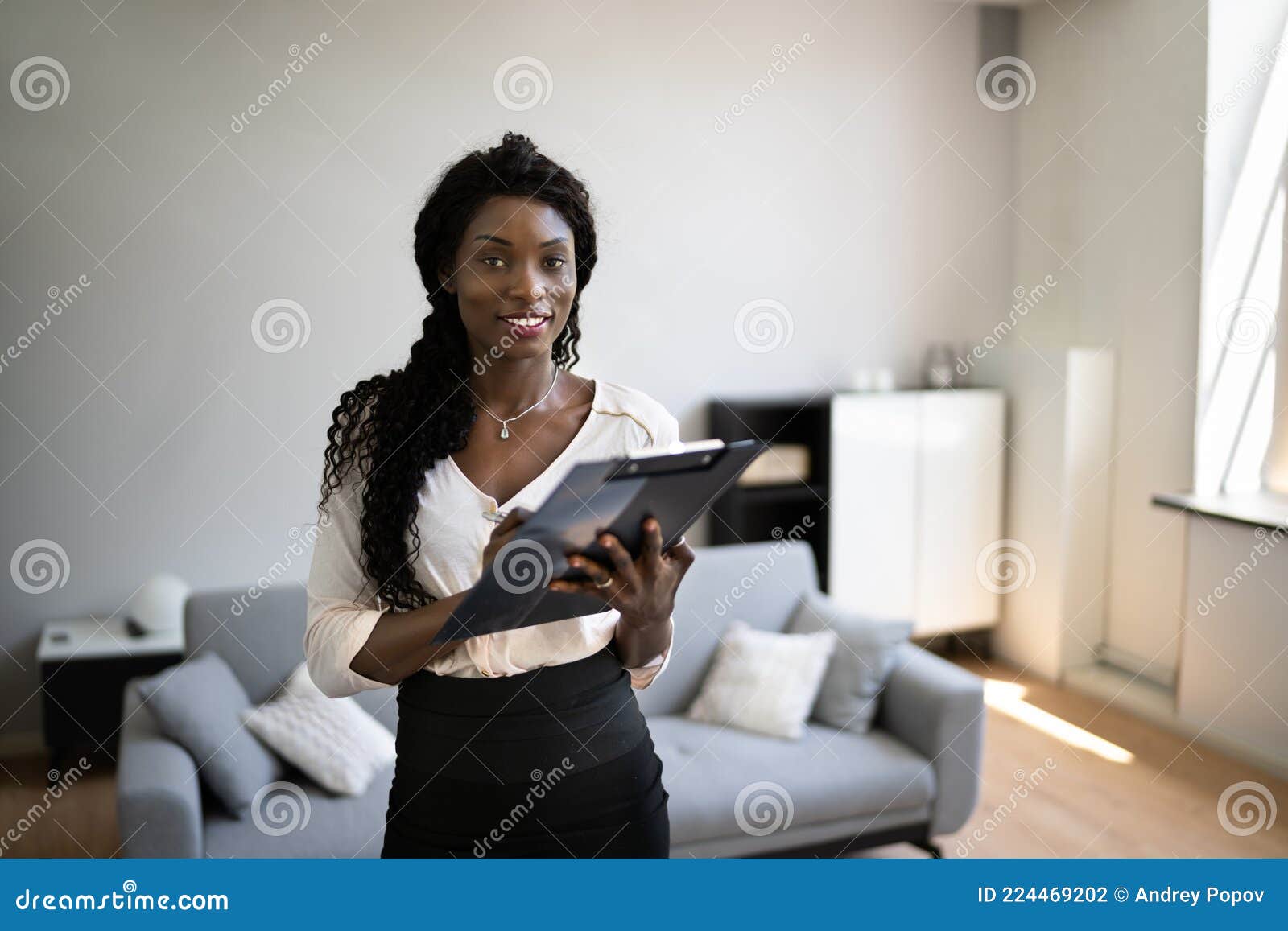 african woman real estate loan appraiser
