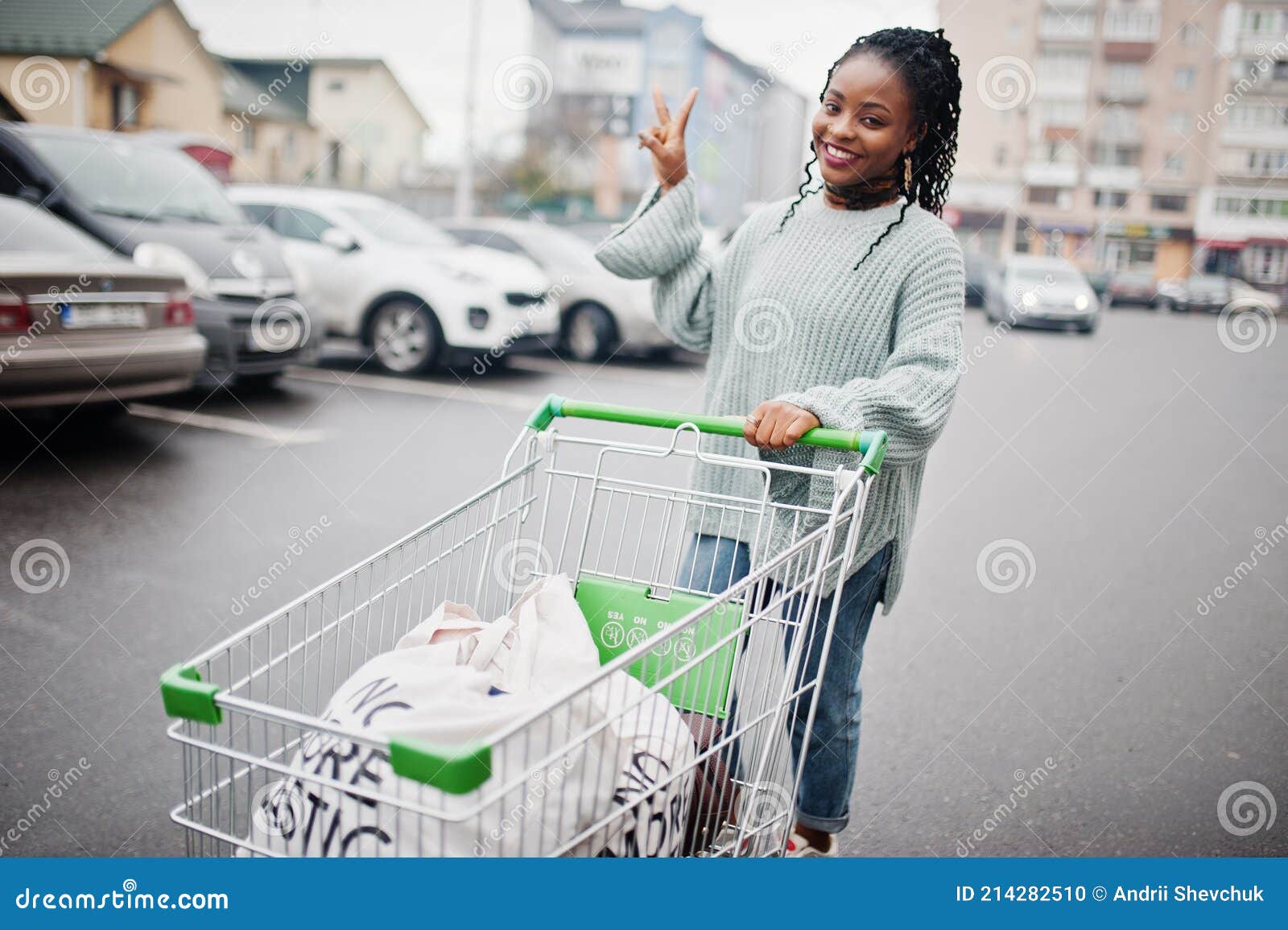 African woman shopper stock photo. Image of hand, happy - 214282510