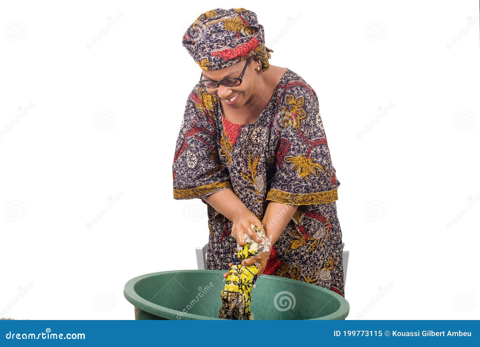 African Woman Washing Clothes At Home Stock Image 