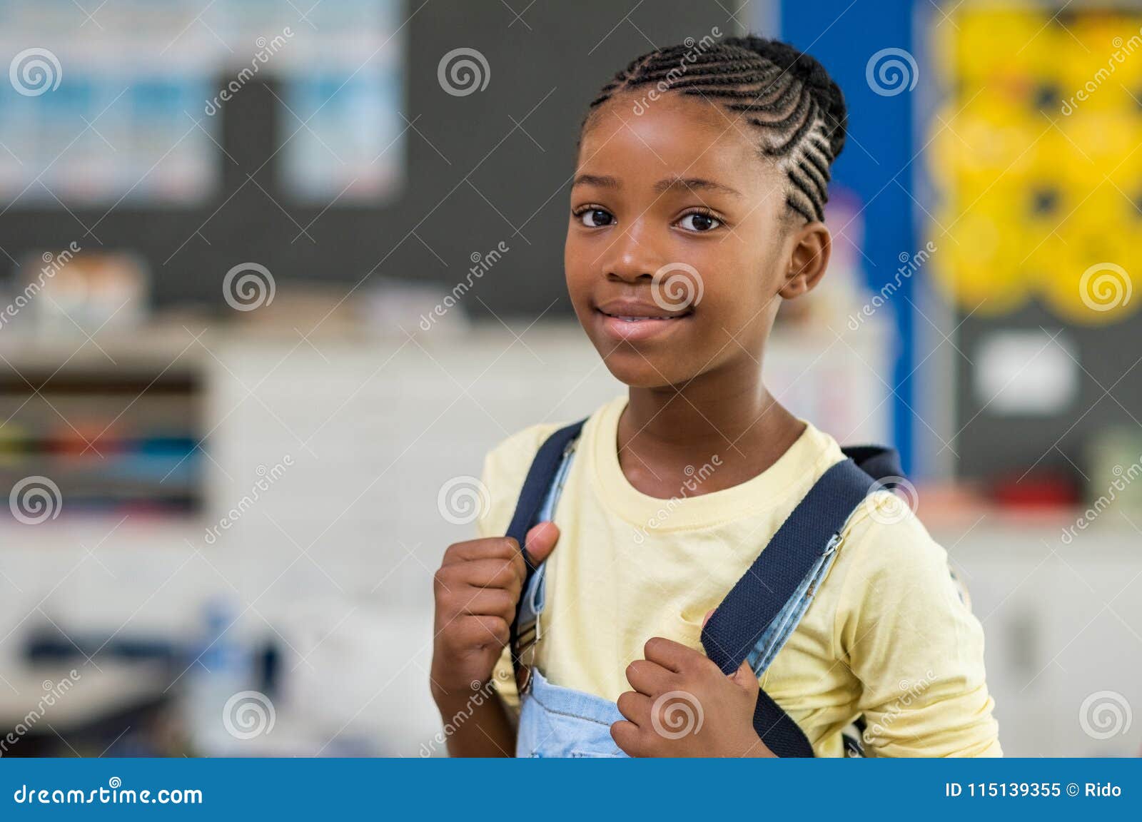 girl wearing backpack at school