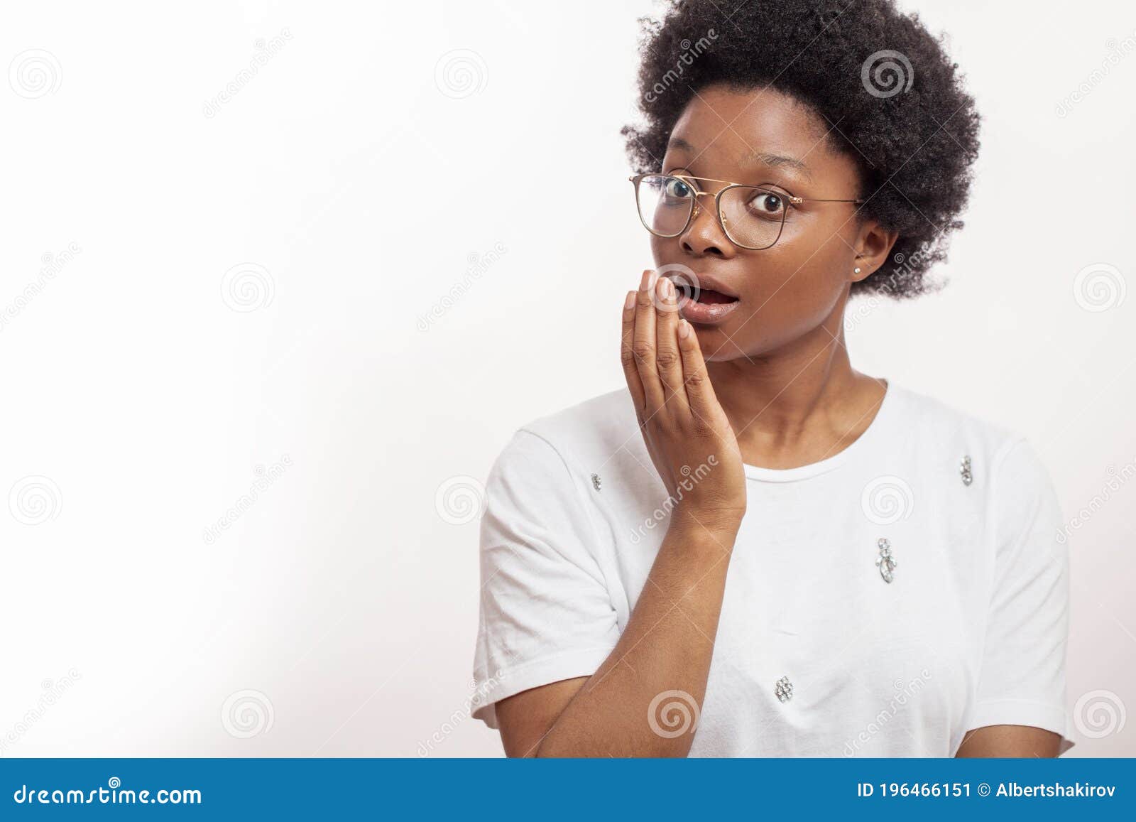 africanamerican woman trying to close her mouth while sneezing
