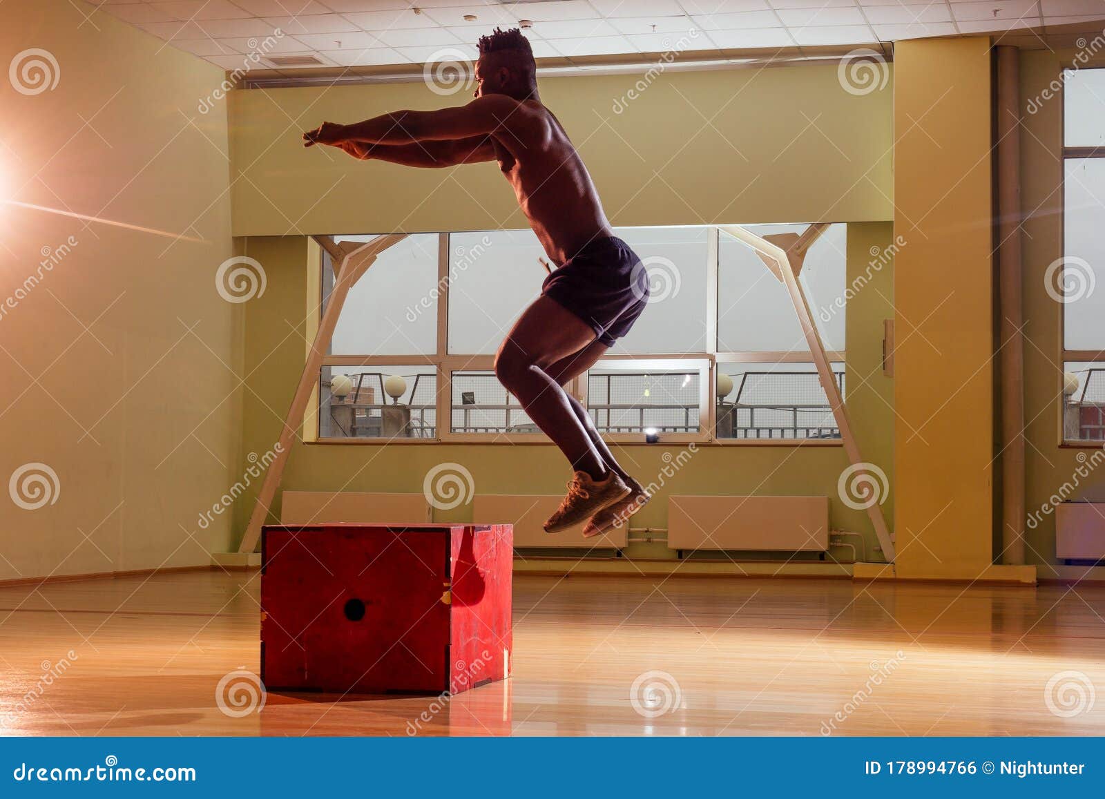 Afro Man Doing Exercise with a Fit Box in a Gym Stock Photo Image of