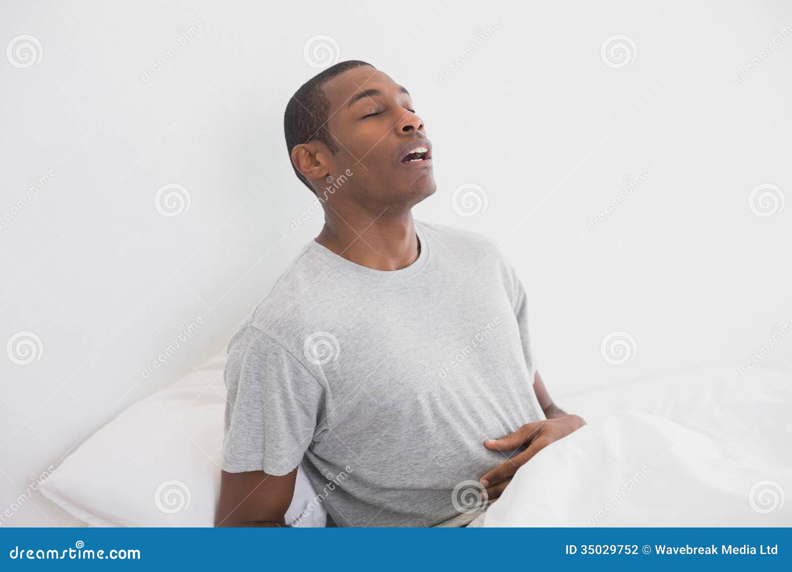 Afro Man Waking Up with Eyes Closed in Bed Stock Photo Image of eyes
