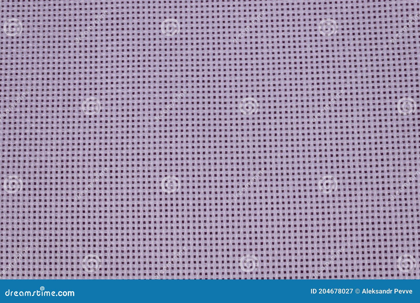 Against a Dark Background, Dense Fabric with Holes is Highlighted in