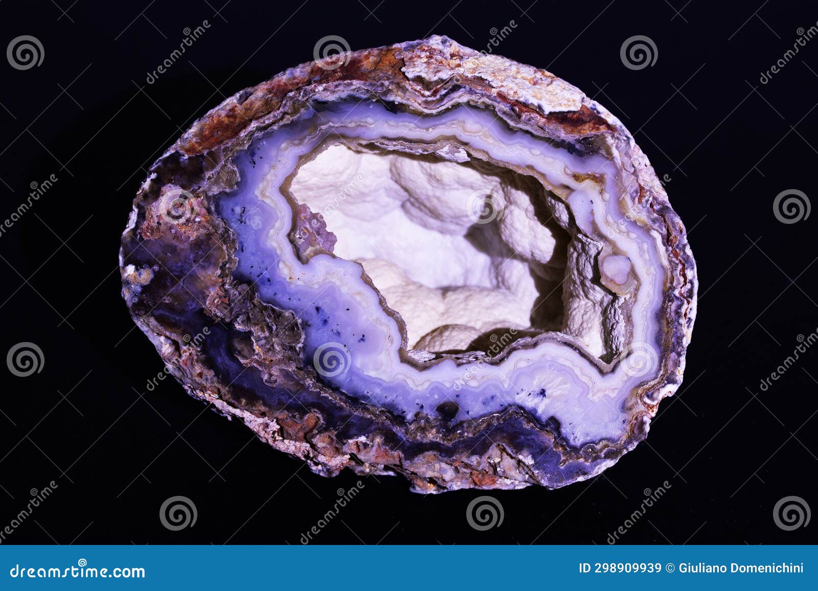 agate semigem geode with crystals  on black background