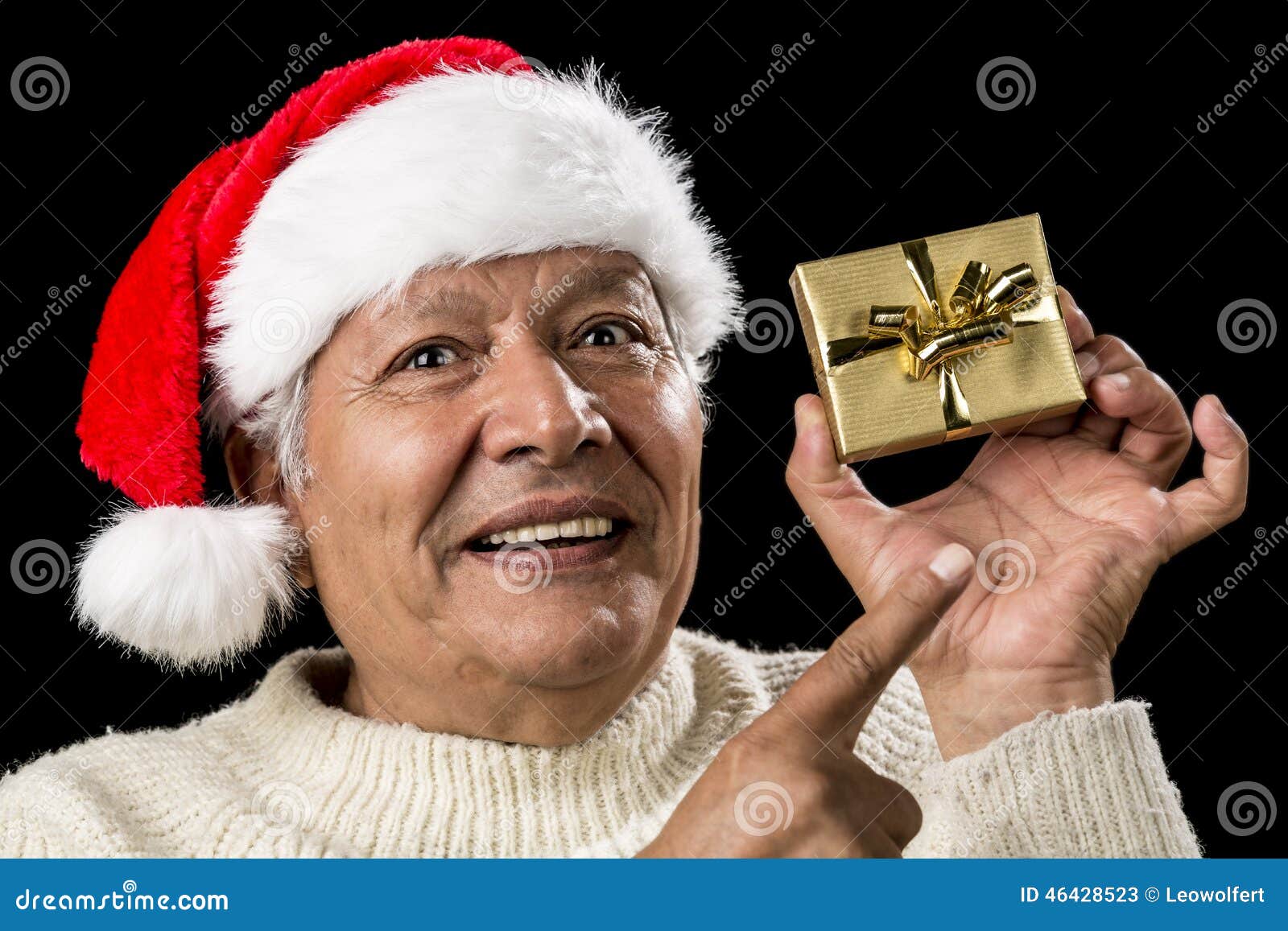 aged man with emphatic look and golden gift