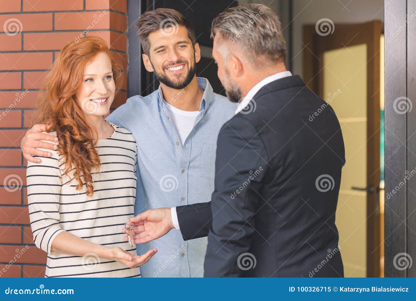 Agent Giving Keys To Smiling Couple Stock Image Image Of Consultant 