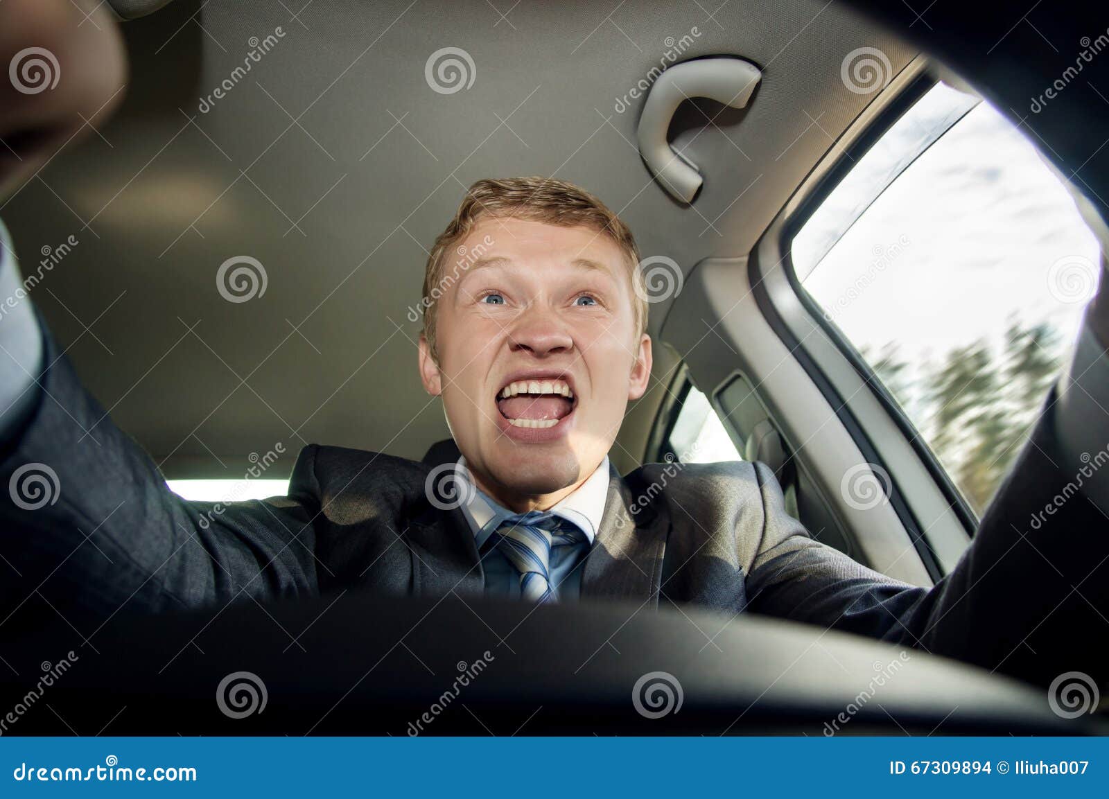Aggressive Driver Behind the Wheel of a Car Stock Photo Image of beep