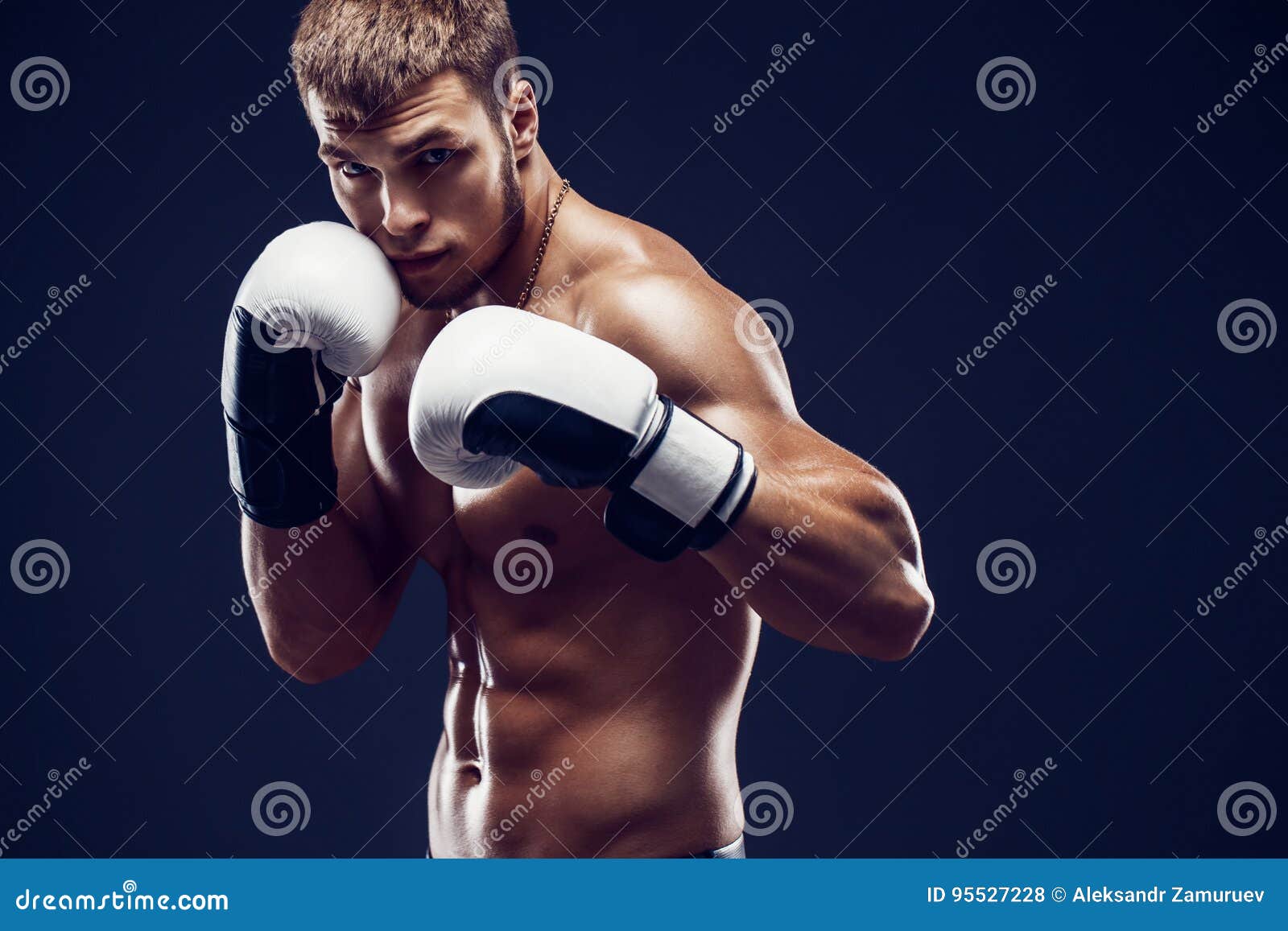 Shirtless Sweaty Boxer Standing Against Black Background 