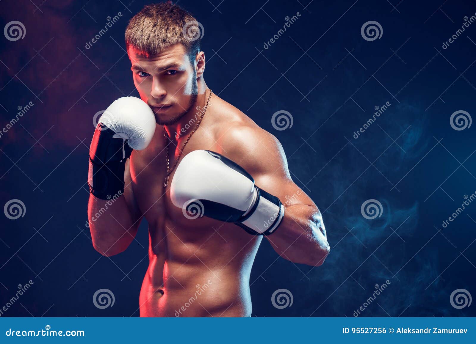 Aggressive Shirtless Boxer on Grey Background. Stock Photo Image of