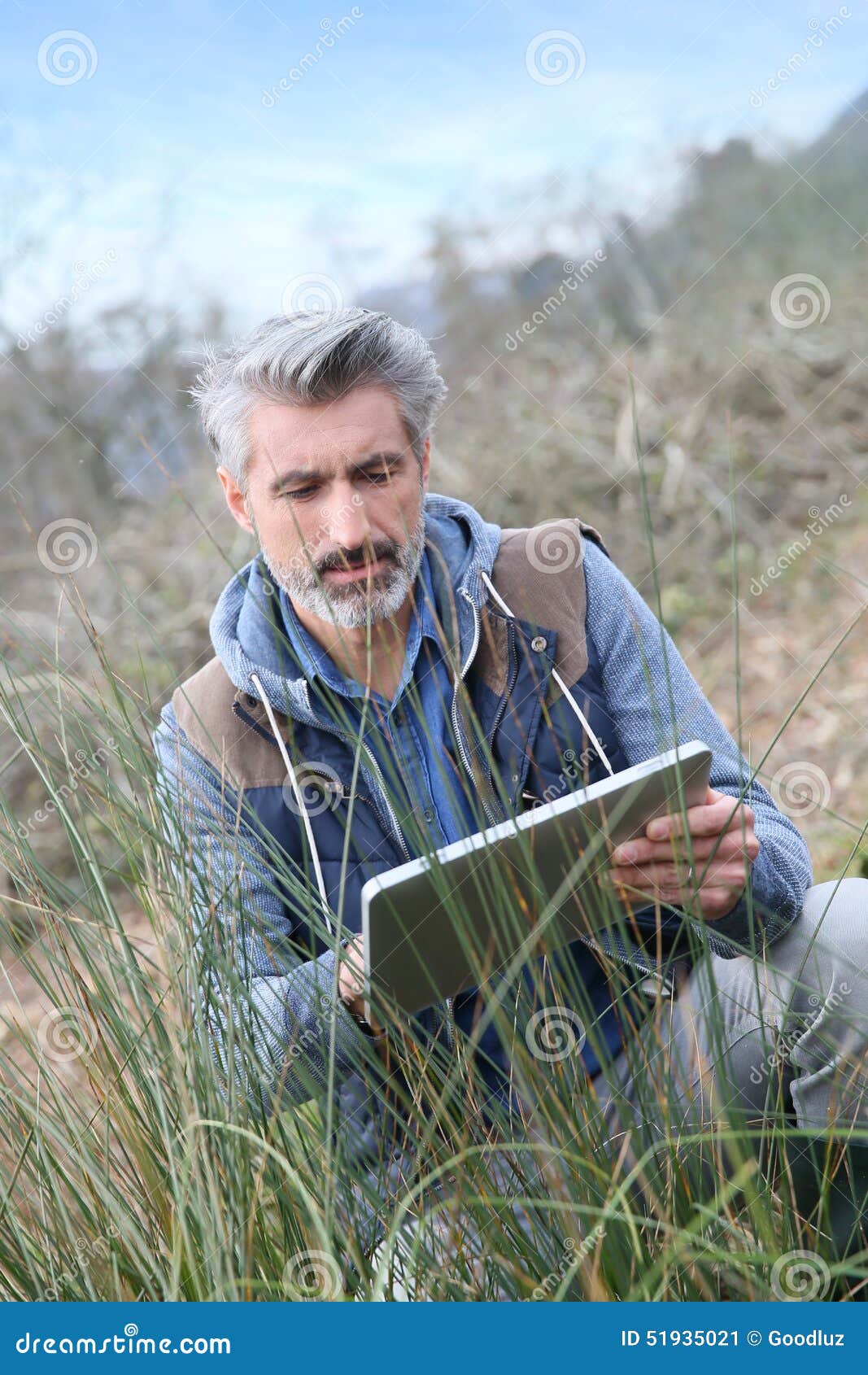 Agronomy Scientist Making Research Using Tablet Outdoors Stock Image